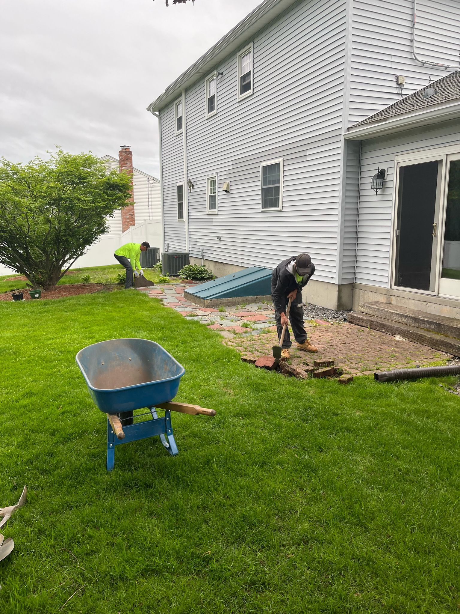 Before image of a backyard renovation project by Marcelino Hardscaping, preparing for a patio transformation in Central Massachusetts, the Metrowest region, and parts of Greater Boston.
